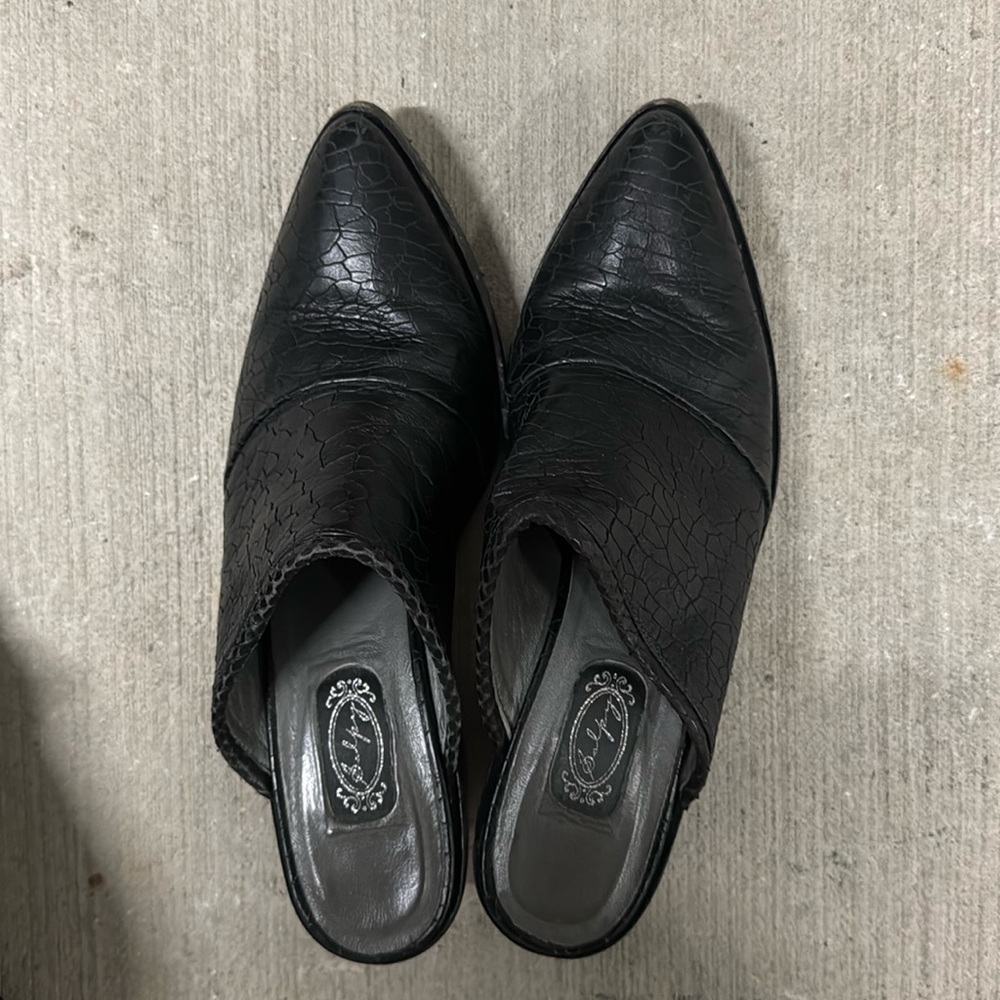 Size 8 1/2 black mules with rubber, bottom, genuine, leather skin